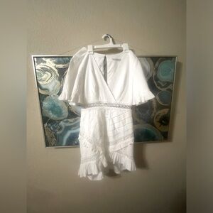 Perfect conditiion , Saints and Secrets little white dress Size Medium